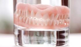 Dentures in glass